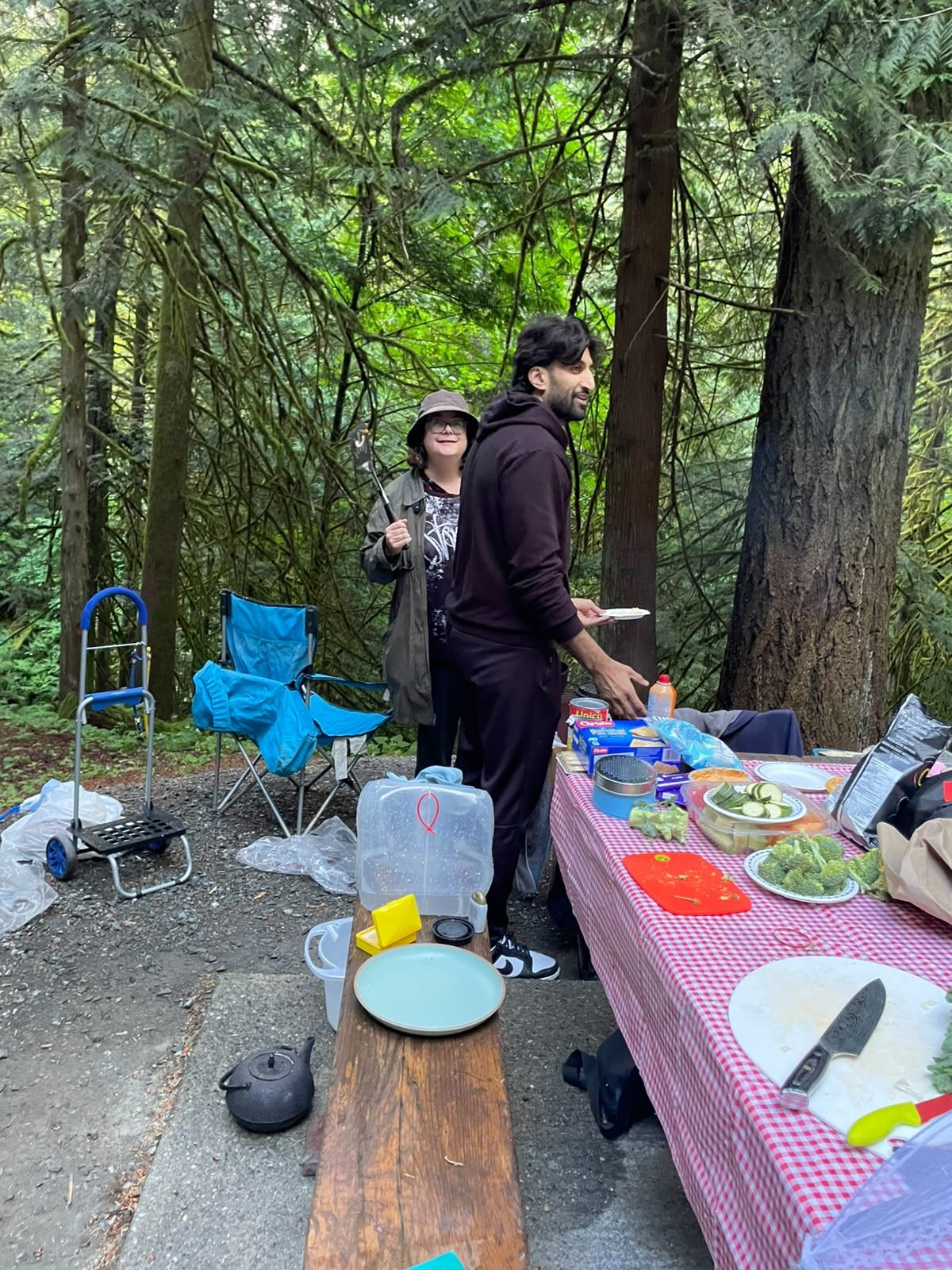 Members preparing food at the picnic table