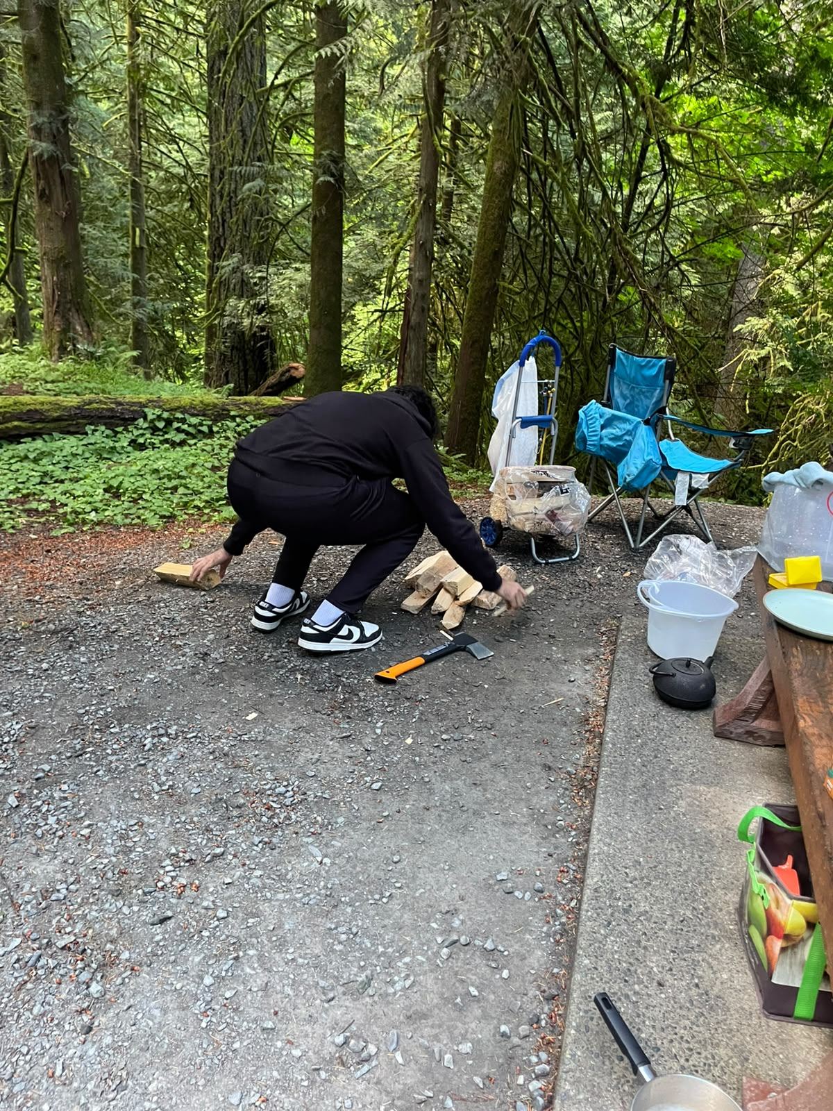 Splitting firewood at the campsite